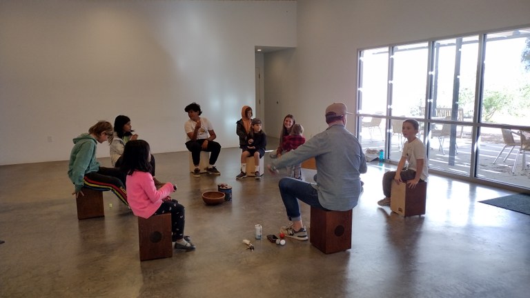Photo of drum circle class in the Marfa Public Library Community Room